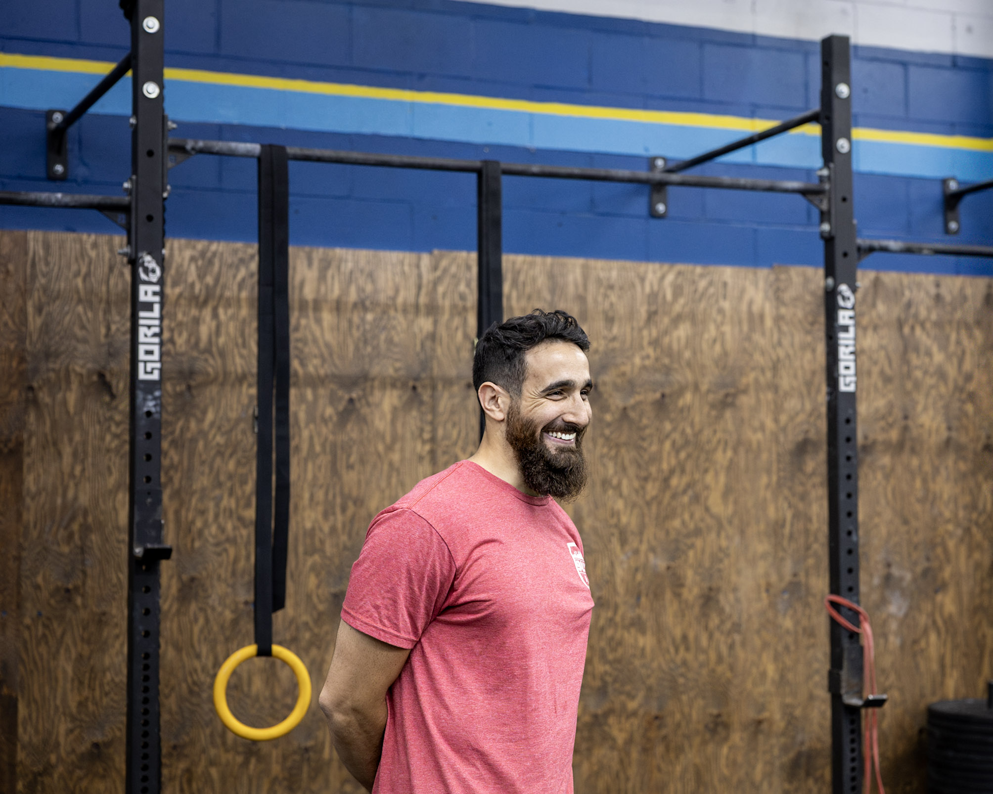Coach Tameem walking a hybrid client through a programmed session
